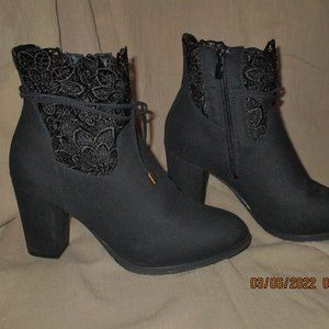 Venus black swede size 7.5 heeled ankle boot